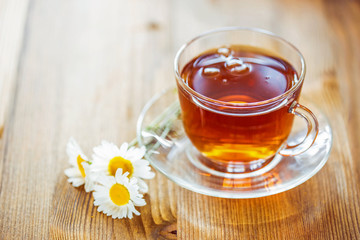 Cup of tea with chamomile