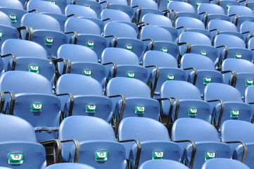 Naklejka premium Row of blue seats at the amphitheater