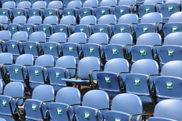 Row of blue seats at the amphitheater