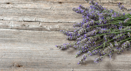 Lavender flowers on wooden background. Vintage still life