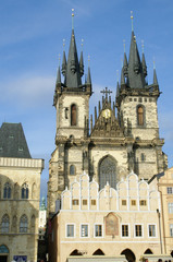 Fototapeta na wymiar Prague Tyn Cathedral & Clock Tower, built in 1400