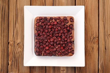 Delicious homemade square cherry chocolate pie in white square p