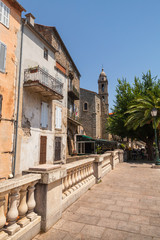 Fototapeta na wymiar Street view with bell tower. Sartene, Corsica