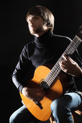 Obraz premium Acoustic guitar player guitarist