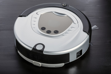Silver robot vacuum cleaner