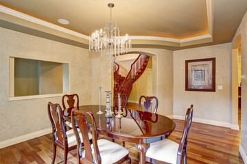 Classical dinning room with beautiful glass chandelier.