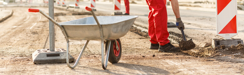 Wheelbarrow at the road construction