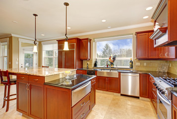 State of the art kitchen with tall island.