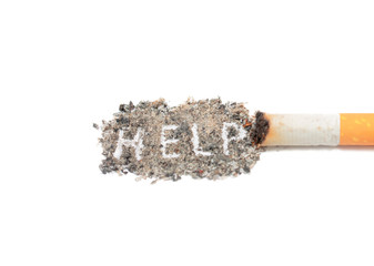 Cigarette butt and ashes isolated