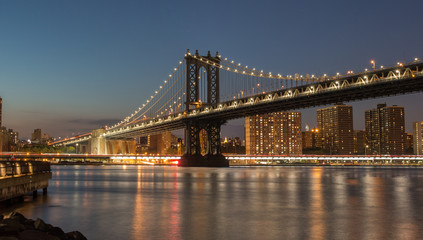 Panoramic View Manhattan Bridge and Manhattan Skyline at Night
