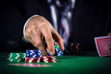 Fototapeta na wymiar Man betting on the casino