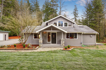 Authentic American home with grass.