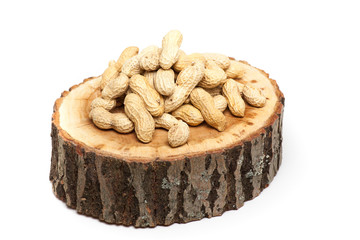 Pile of unshelled peanuts, isolated on white background