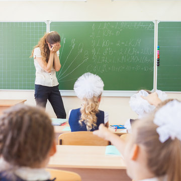 Teacher Woman In Stress Or Depression At School Classroom