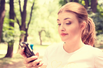 upset skeptical unhappy serious woman talking texting on phone