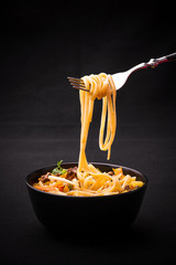 Uzbek noodle soup Lagman with fork