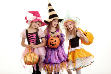 Three Cute Little Witches with Jack O' Lantern
