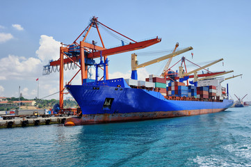 Cargo container ship anchored in harbor