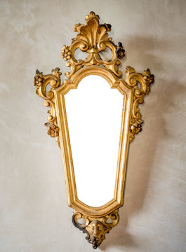 classic antique mirror with gilded frame suitable as a frame or