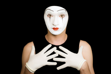 Portrait of  mime in white gloves