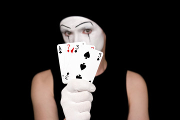  mime with playing cards on  black background