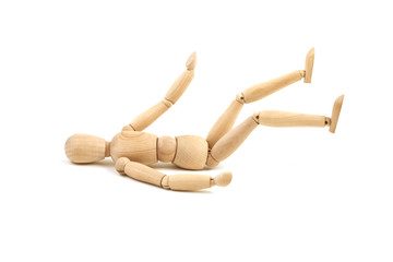 Laying wooden dummy isolated