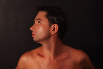 Fototapeta premium young beautiful tanned guy