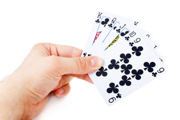  man's hand holding playing cards