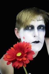 gloomy mime with  red flower