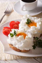 Breakfast aristocratic: sandwiches with baked eggs Orsini 
