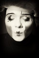 Portrait of the surprise mime in a veil