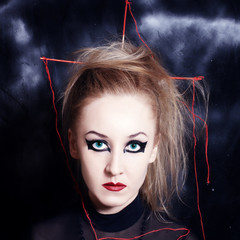young woman with bright Gothic makeup