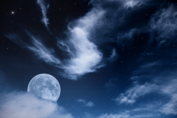 Naklejka na ściany i meble night landscape with the moon, clouds and stars