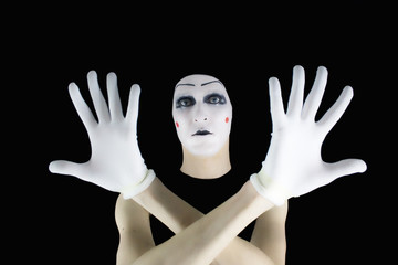 Portrait of the mime in white gloves