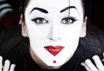 beautiful woman mime with green eyes
