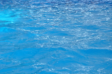 beautiful clear pool water reflecting in the sun background