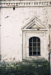 Fototapeta na wymiar Window in an old brick building