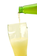 Bottle and glass with foamy beer