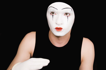 Portrait of  mime in white gloves