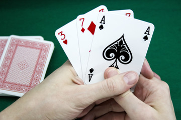 Playing cards in a hand
