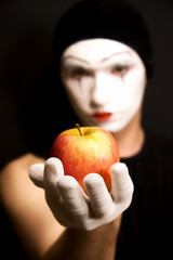 Mime with red apple