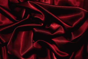 Texture of a red silk closeup