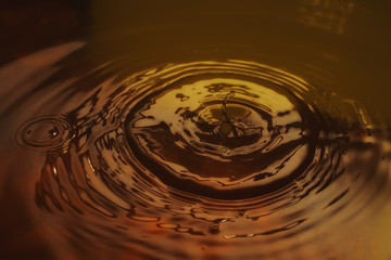 Wavy  yellow water surface