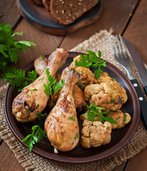 Chicken leg with baked cauliflower and parsley