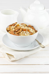 Oatmeal flakes with nuts in bowl
