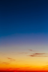 Naklejka premium Orange, Yellow Blue Sunrise Sky With Sunlight Sunset Background