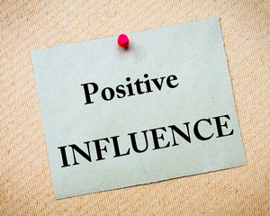 Positive Influence Message written on paper note