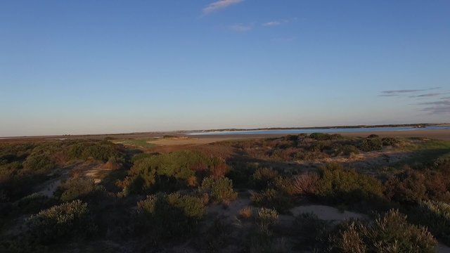 Aerial footage images and elevated view of river murray mouth in coorong and lower lakes. Famous place for coorong sandhills, sand dunes, wetlands, fishing and and boating in South Australia