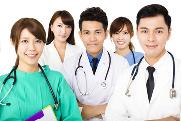 smiling Medical team standing together isolated on white