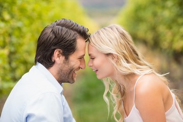Young happy couple smiling at each other